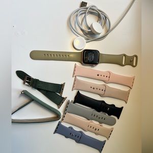 Apple Watch Series 4 40mm with 9 bands and 2 chargers